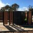 Enclosing water tank fencing solution Melbourne